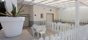 Casa FRONTEMARE Posto Rosso